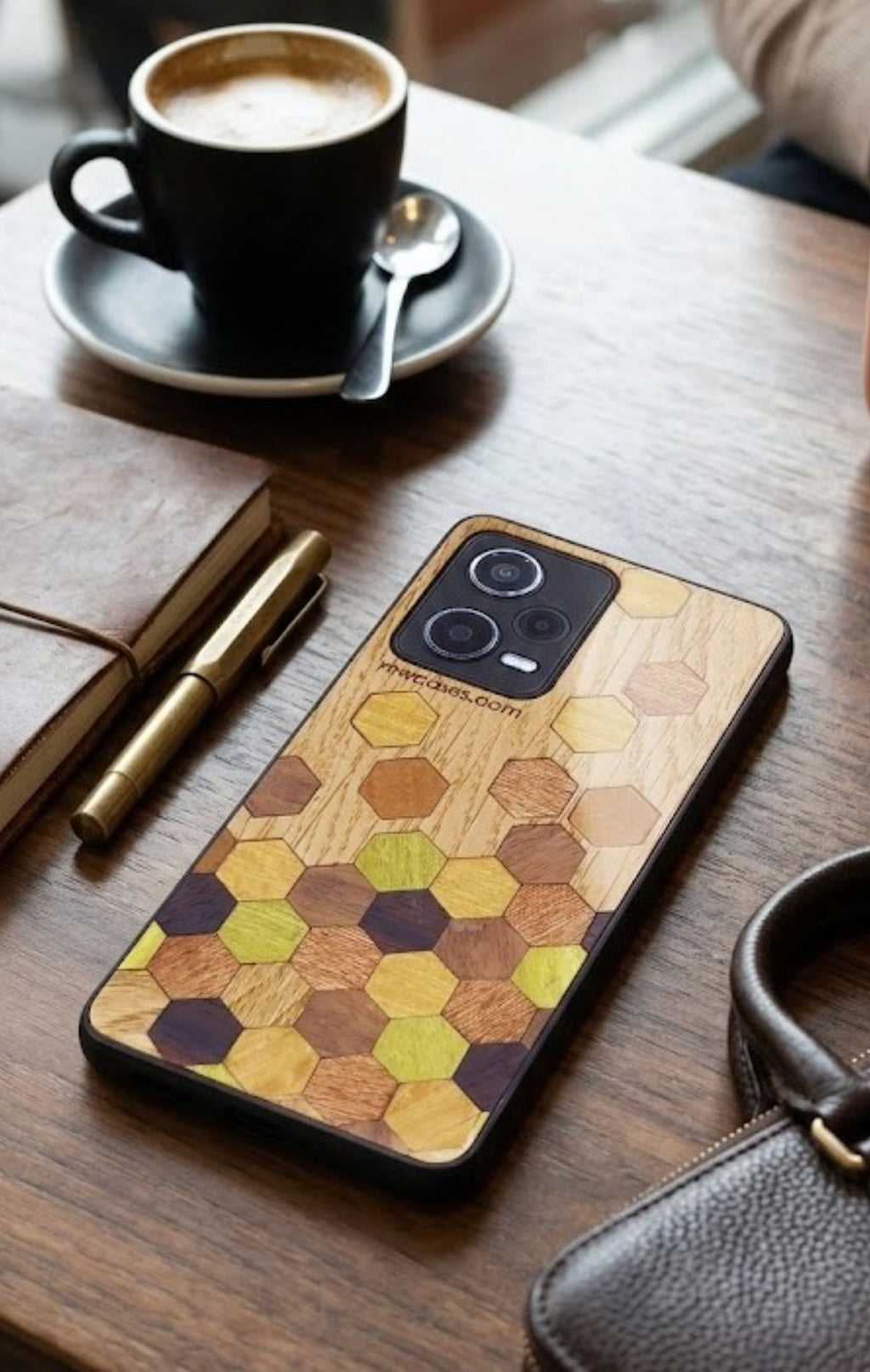 wooden marquetry phone case with hexagon pattern on table