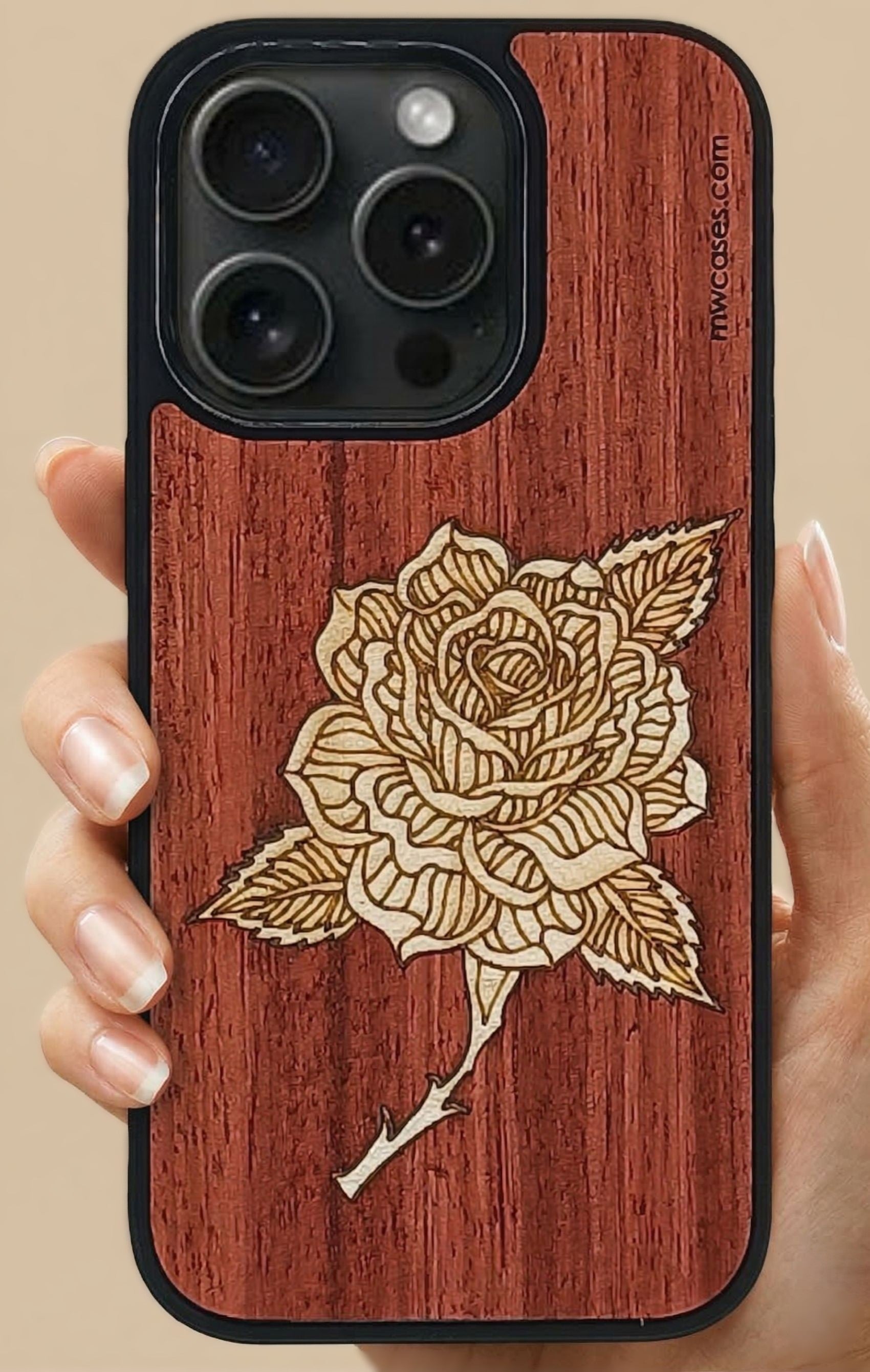 wooden marquetry phone case with rose engraved motiv in hand of a woman